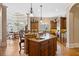Gourmet kitchen with granite counters, stainless appliances, and a spacious central island at 8295 St Marlo Fairway Dr, Duluth, GA 30097