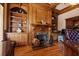 Handsome home office featuring custom built-ins, a fireplace, and rich wood finishes at 8295 St Marlo Fairway Dr, Duluth, GA 30097