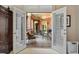 An open patio with brick and stone with an outdoor seating area, perfect for relaxation at 8295 St Marlo Fairway Dr, Duluth, GA 30097