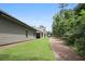 View of home's backyard with a long narrow lawn at 3112 Patriot Sw Sq, Marietta, GA 30064