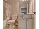 Bathroom with white fixtures, shower, tub, and ornate tile at 3112 Patriot Sw Sq, Marietta, GA 30064