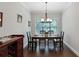 Classic dining room with hardwood floors, ample light, and traditional decor at 3112 Patriot Sw Sq, Marietta, GA 30064