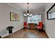 Dining room with hardwood floors, chandelier, and natural light at 3112 Patriot Sw Sq, Marietta, GA 30064