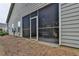 View of the back of the house, highlighted by a screened in porch, showcasing a relaxing outdoor space at 3112 Patriot Sw Sq, Marietta, GA 30064