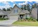 Charming, single-story home boasts a manicured lawn, attached garage and welcoming front porch at 3112 Patriot Sw Sq, Marietta, GA 30064