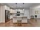 Beautiful kitchen with white cabinets, stainless steel appliances, and a spacious center island at 3112 Patriot Sw Sq, Marietta, GA 30064