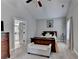 Main bedroom with high ceilings and neutral color palette at 3112 Patriot Sw Sq, Marietta, GA 30064