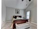 Main bedroom with high ceilings and neutral color palette at 3112 Patriot Sw Sq, Marietta, GA 30064