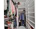 Organized walk-in closet featuring shelving, hanging space, and ample storage at 3112 Patriot Sw Sq, Marietta, GA 30064