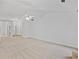 Spacious living room with neutral carpet, white walls and plenty of light at 554 Grand Ashbury Ln, Sugar Hill, GA 30518