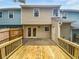 Backyard featuring a wood deck, patio, and fenced yard, providing a great outdoor living space at 688 Anderson Walk, Marietta, GA 30062