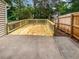 Backyard featuring a wood deck and concrete patio, perfect for outdoor living and entertaining at 688 Anderson Walk, Marietta, GA 30062