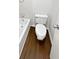 Bathroom features white fixtures, vinyl flooring, and a bathtub with shower at 688 Anderson Walk, Marietta, GA 30062