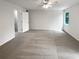 Large main bedroom featuring neutral walls and soft carpet. (Not staged) at 688 Anderson Walk, Marietta, GA 30062