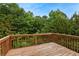 Outdoor back deck with a beautiful, scenic tree view at 179 Oakville Dr, Dallas, GA 30157