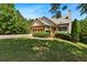 Inviting exterior with well-maintained lawn, garage, and entrance steps at 179 Oakville Dr, Dallas, GA 30157