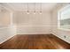 Elegant dining room featuring modern pendant lighting and hardwood floors at 1955 Vicki Se Ln, Atlanta, GA 30316