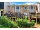 Charming brick townhouse with a two-level backyard deck perfect for entertaining at 2435 Northlake Ct, Atlanta, GA 30345