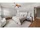 Bedroom with two large closets, a ceiling fan and an adjacent doorway at 2435 Northlake Ct, Atlanta, GA 30345