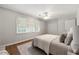 Bright bedroom with a window, closet, and cozy bed, perfect for relaxation at 2435 Northlake Ct, Atlanta, GA 30345