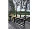 Inviting deck overlooking a serene lake, perfect for relaxing and enjoying the peaceful scenery at 2435 Northlake Ct, Atlanta, GA 30345