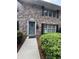 Inviting brick exterior with a well-maintained lawn and trimmed bushes at 2435 Northlake Ct, Atlanta, GA 30345
