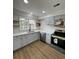 Bright kitchen features updated stainless steel appliances and new countertops at 2435 Northlake Ct, Atlanta, GA 30345