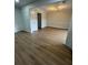 Living room with updated flooring, recessed lighting, and open layout perfect for entertaining and relaxation at 2435 Northlake Ct, Atlanta, GA 30345