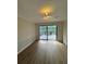 Bright dining area features laminate floors and sliding doors leading to a deck at 2435 Northlake Ct, Atlanta, GA 30345