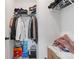 Organized walk-in closet with shelves and hanging rods, perfect for storage at 2808 Maddison Towns Ave, Norcross, GA 30071