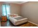 Cozy bedroom with soft lighting, comfy bed, and hardwood flooring at 4046 Creekview Ridge Dr, Buford, GA 30518