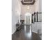 Elegant foyer features a grand chandelier, hardwood floors, and a bright, welcoming entrance at 4046 Creekview Ridge Dr, Buford, GA 30518