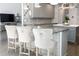 Stylish kitchen island with granite countertops and comfortable seating, perfect for entertaining at 4046 Creekview Ridge Dr, Buford, GA 30518