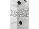 Modern shower showcasing patterned tiles and bronze shower head at 4046 Creekview Ridge Dr, Buford, GA 30518