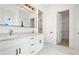 Bathroom with double vanity, stone countertops and walk in closet at 4824 Se Highway 20, Conyers, GA 30013