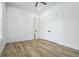 Bedroom with ceiling fan, laminate wood flooring, and closet at 4824 Se Highway 20, Conyers, GA 30013