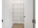 Pantry closet with white metal racks at 4824 Se Highway 20, Conyers, GA 30013
