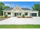 Charming single-story home features a modern farmhouse design, inviting entrance, and a spacious driveway at 4824 Se Highway 20, Conyers, GA 30013