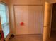 Bedroom showing closet and window view with weight equipment at 5570 Chemin De Vie, Atlanta, GA 30342