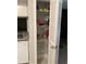 Pantry with shelving stocked with food items and spices at 5570 Chemin De Vie, Atlanta, GA 30342