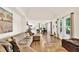 Open-concept living room flowing into the dining area, ideal for entertaining guests at 230 Channings Lake Dr, Lawrenceville, GA 30043