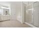 Bathroom with a soaking tub and frameless shower that boasts double sinks with lots of storage at 606 Hay Meadow, Acworth, GA 30102
