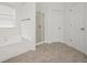 Bright bathroom showcasing a soaking tub, glass-enclosed shower, and neutral tones at 606 Hay Meadow, Acworth, GA 30102