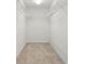 Walk-in closet featuring ample shelving and lighting for organized storage at 606 Hay Meadow, Acworth, GA 30102