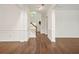 Bright foyer with hardwood floors, white trim, and a stairway to the second floor at 606 Hay Meadow, Acworth, GA 30102