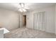 Neutral-toned bedroom featuring a large closet, ample space, and a serene atmosphere at 965 Heards Ferry Rd, Sandy Springs, GA 30328