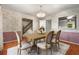 Elegant dining room featuring hardwood floors, chandelier, and decorative wallpaper at 965 Heards Ferry Rd, Sandy Springs, GA 30328