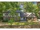 Charming two-story Tudor style home with brick and stucco exterior at 965 Heards Ferry Rd, Sandy Springs, GA 30328