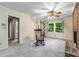 This living room offers a fireplace, a rocking chair, and natural light at 965 Heards Ferry Rd, Sandy Springs, GA 30328