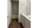 A bathroom with double sinks and white marble countertops at 1001 Limburg Dr, Hampton, GA 30228